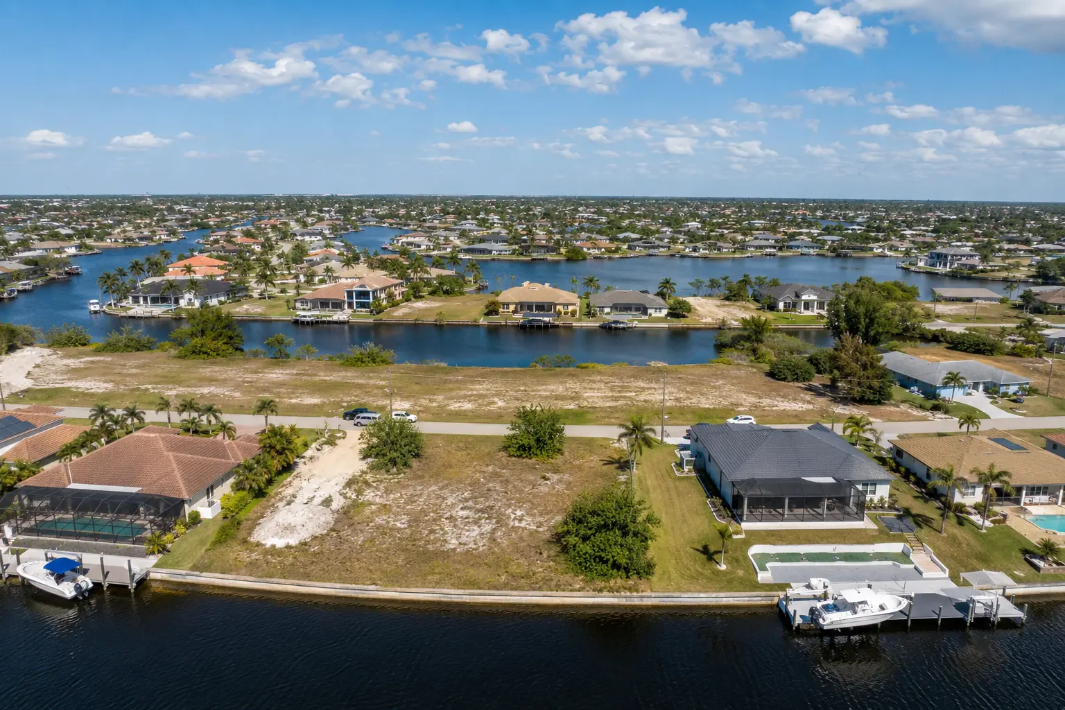 Build in Cape Coral website resource for buyers researching land builders costs insurance and waterfront property