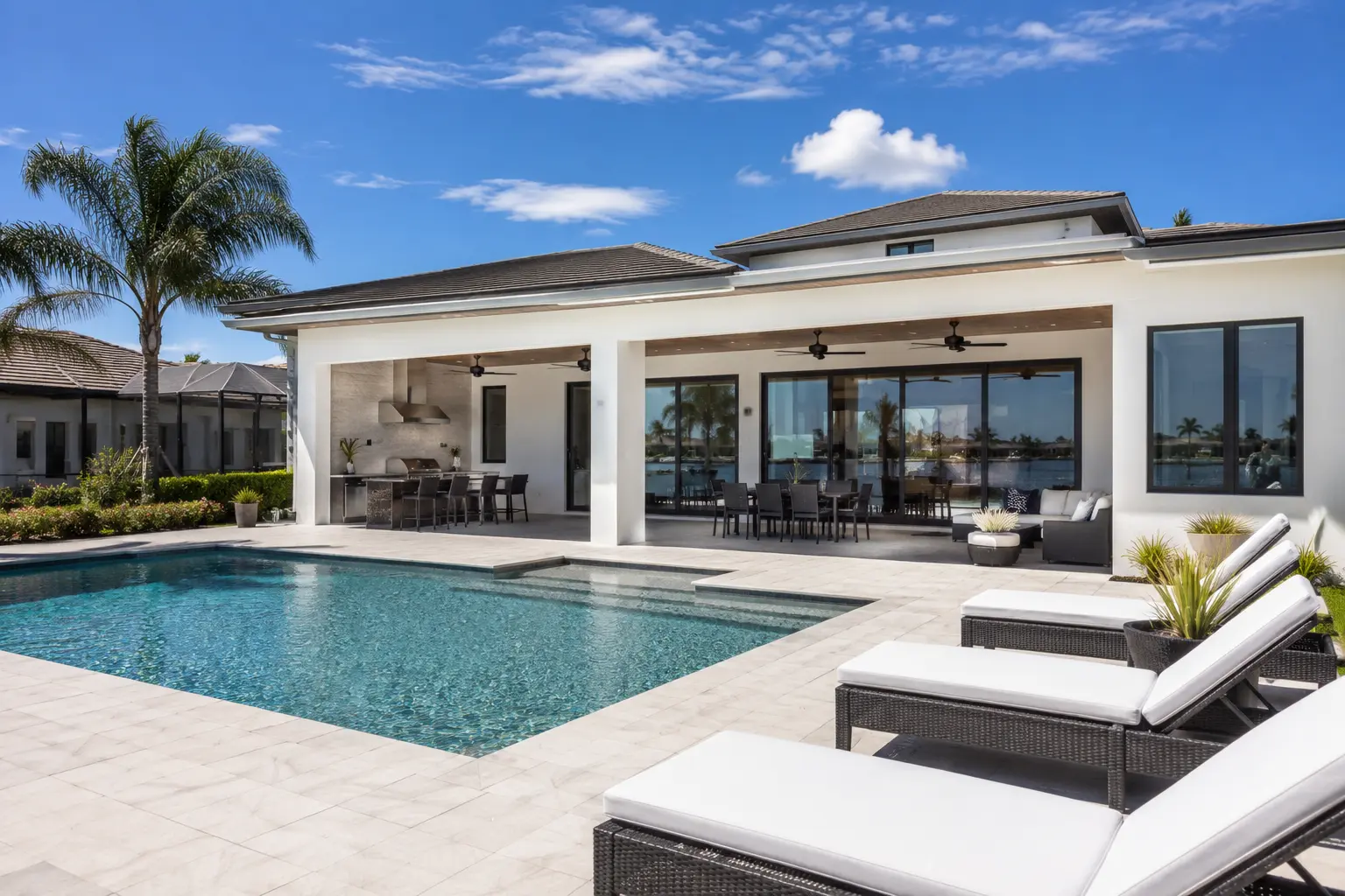 Cape Coral custom home designed for Florida living with pool lanai and outdoor space