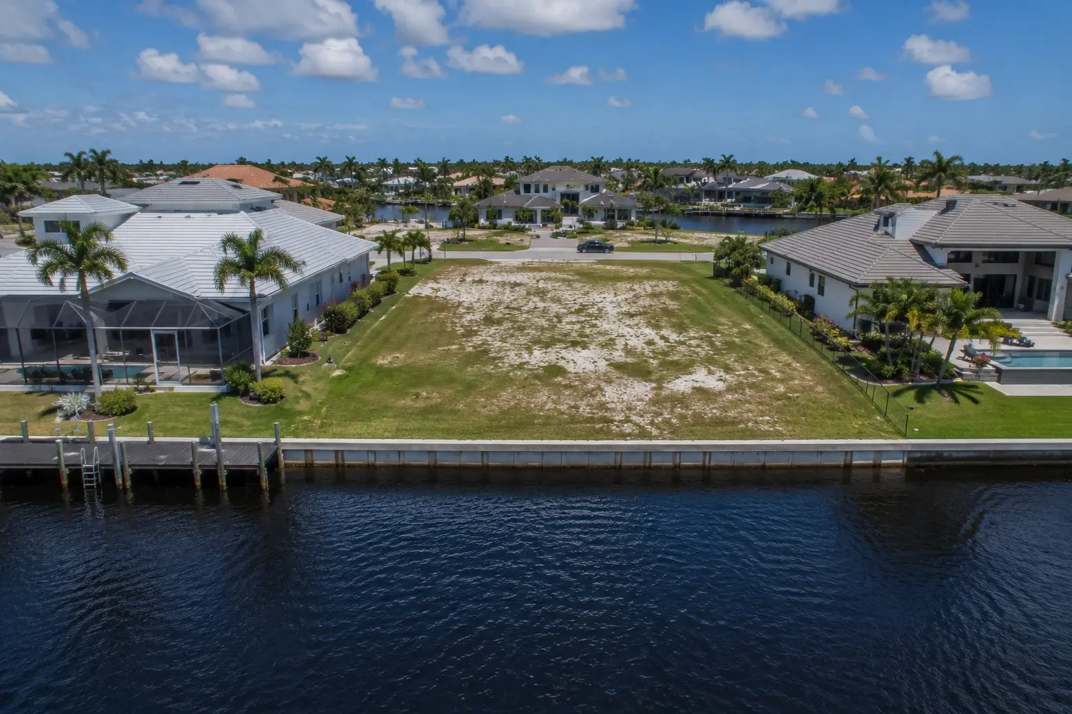 Cape Coral total home building project cost including land site preparation construction utilities pools financing and closing costs