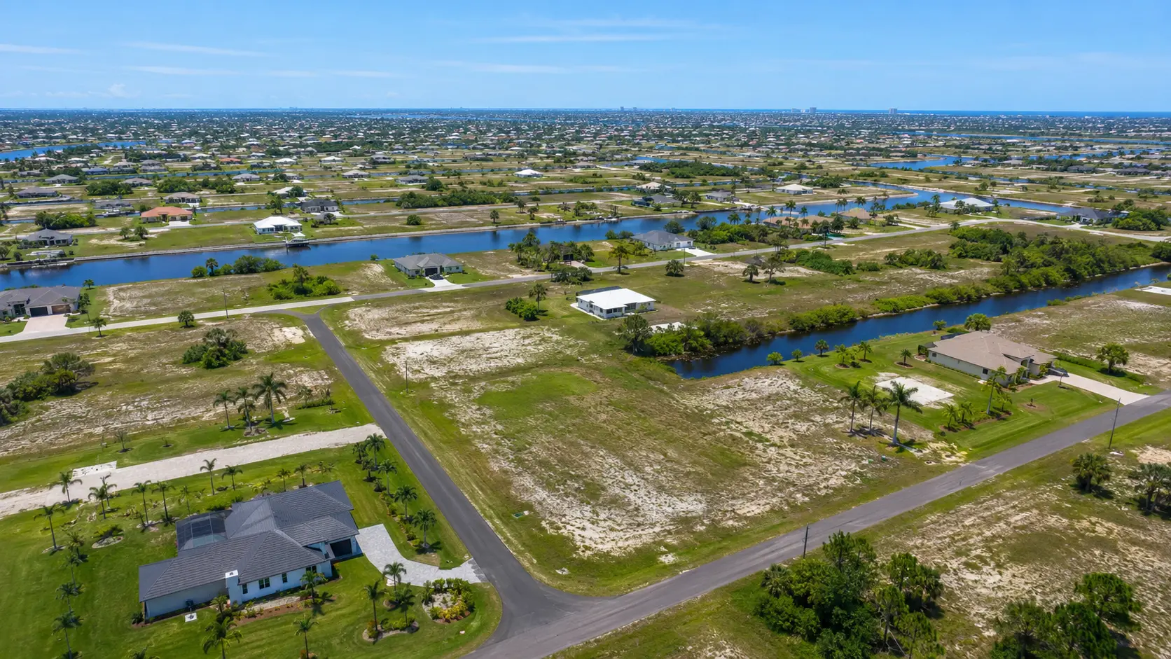 Northwest Cape Coral residential neighborhoods with newer homes and vacant lots