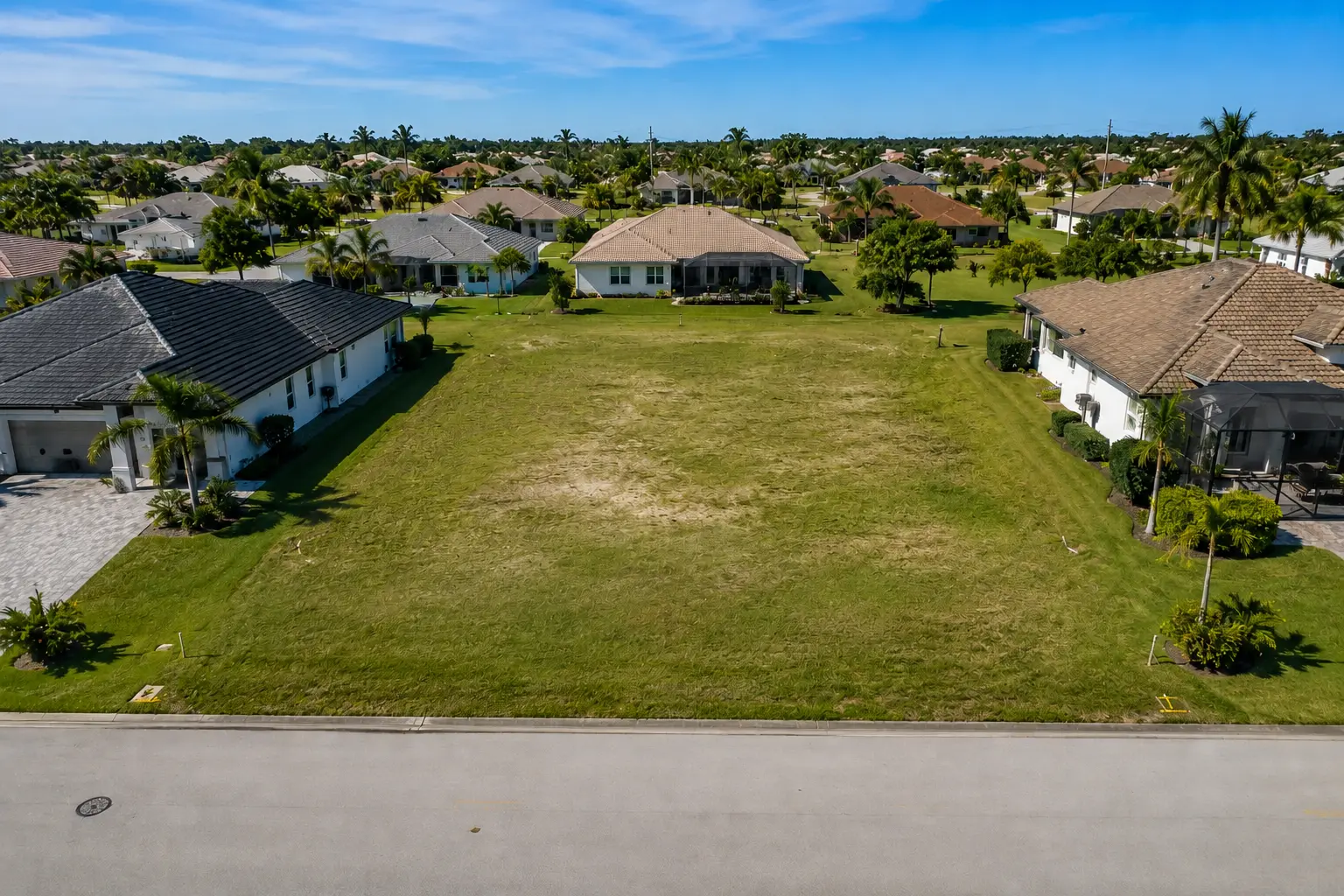 Cape Coral non-canal residential homesite with space for a custom home pool lanai and landscaping