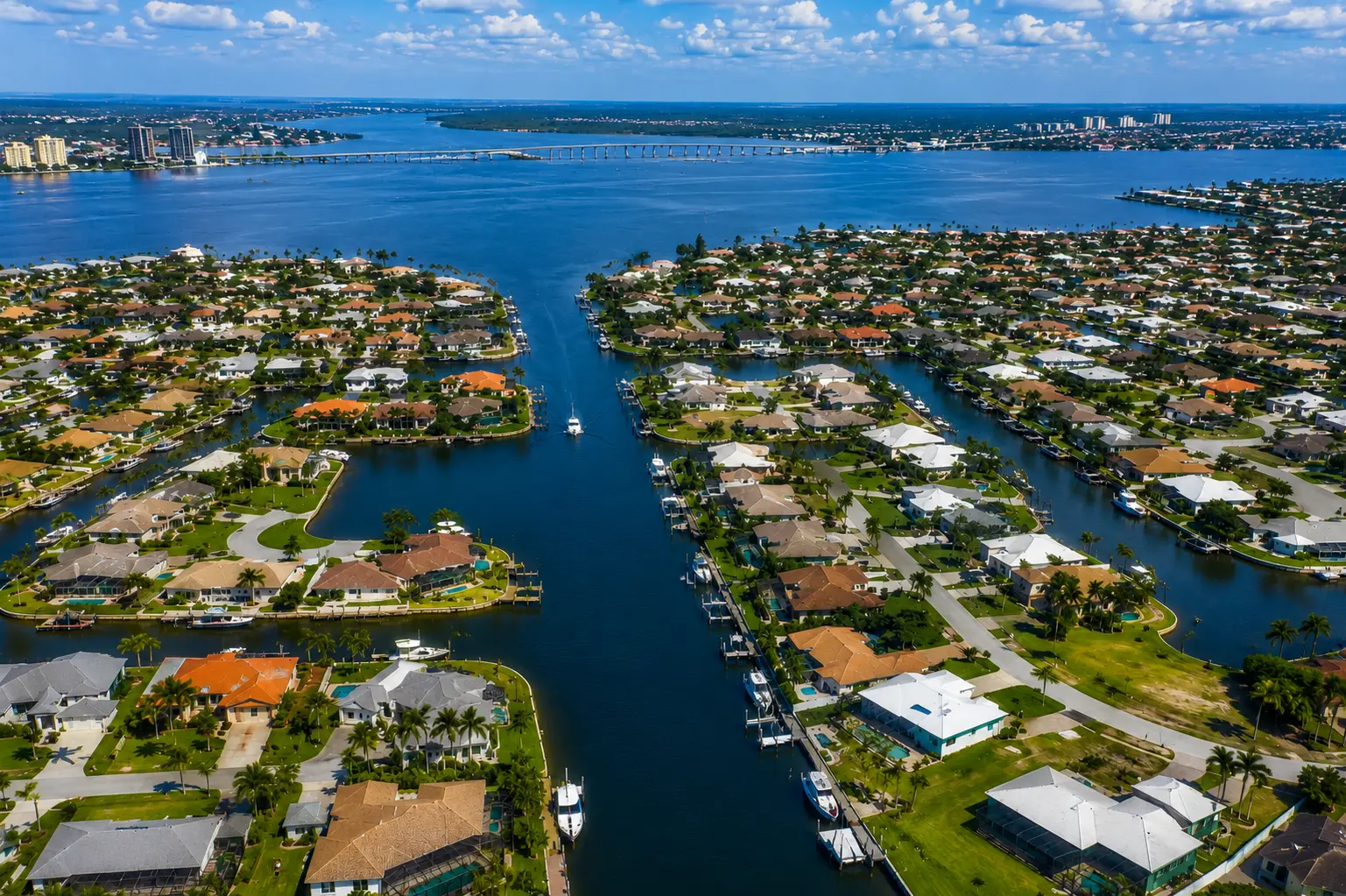 Cape Coral saltwater canal lot with seawall dock boat lift and waterfront improvement considerations