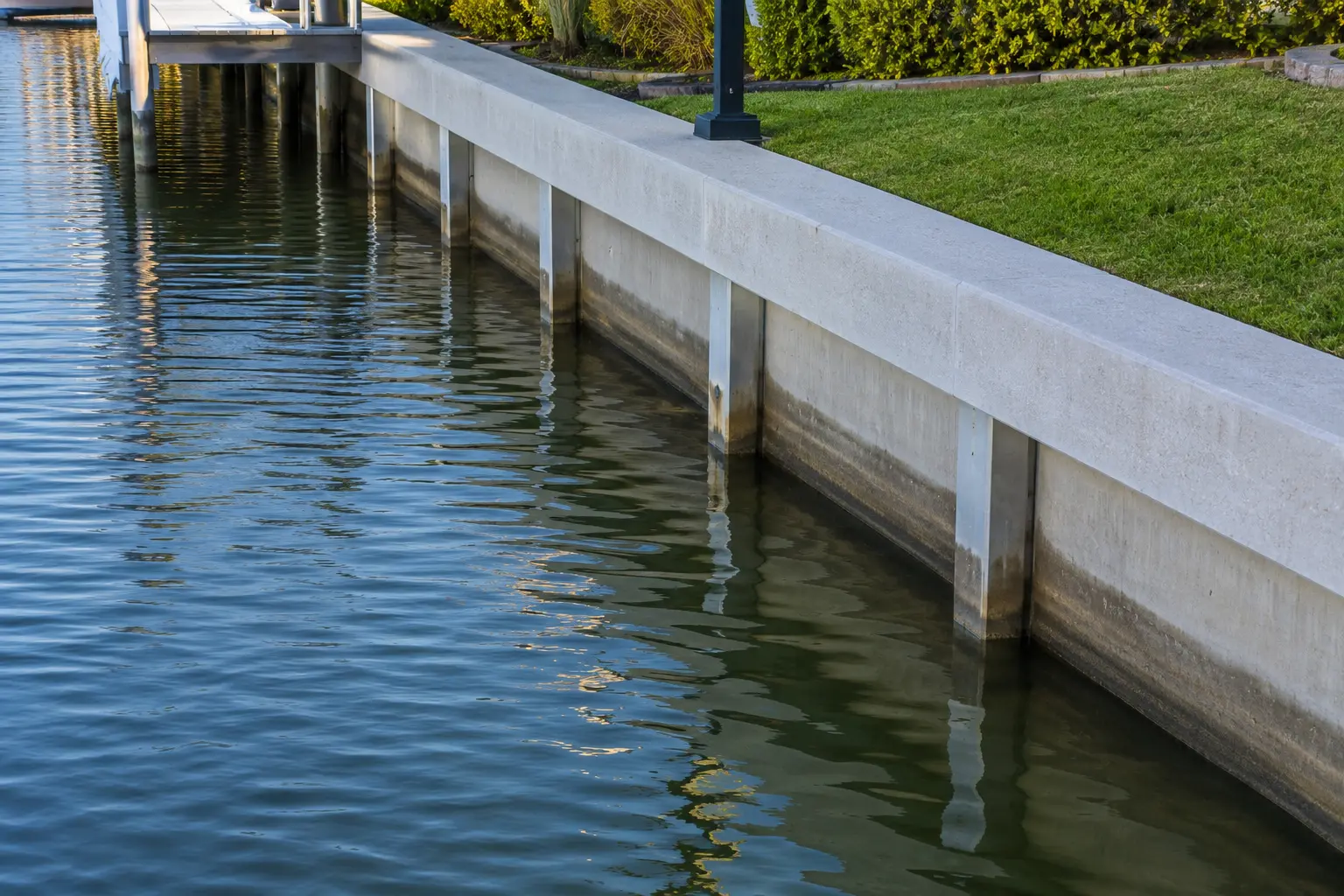 Cape Coral seawall stabilizing a canal-front lot for docks boat lifts and waterfront improvements